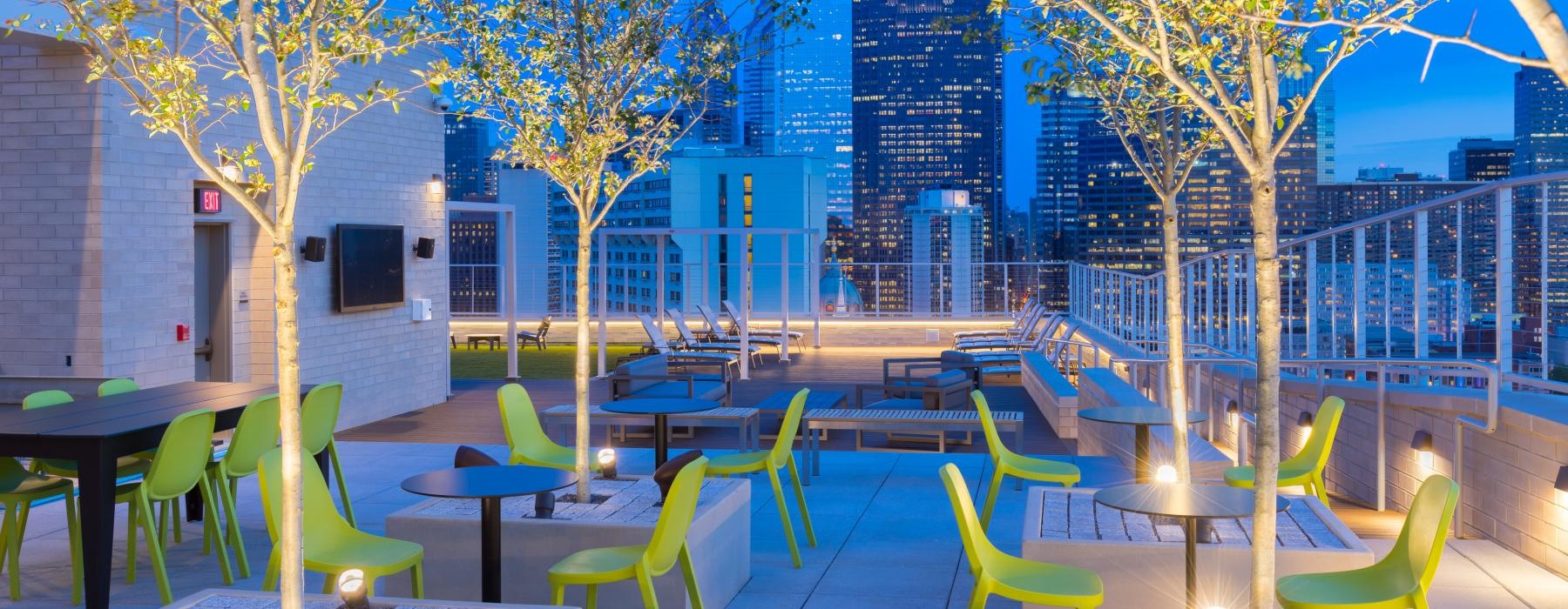 a group of tables and chairs outside